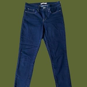Levis 311 skinny jeans, dark wash.